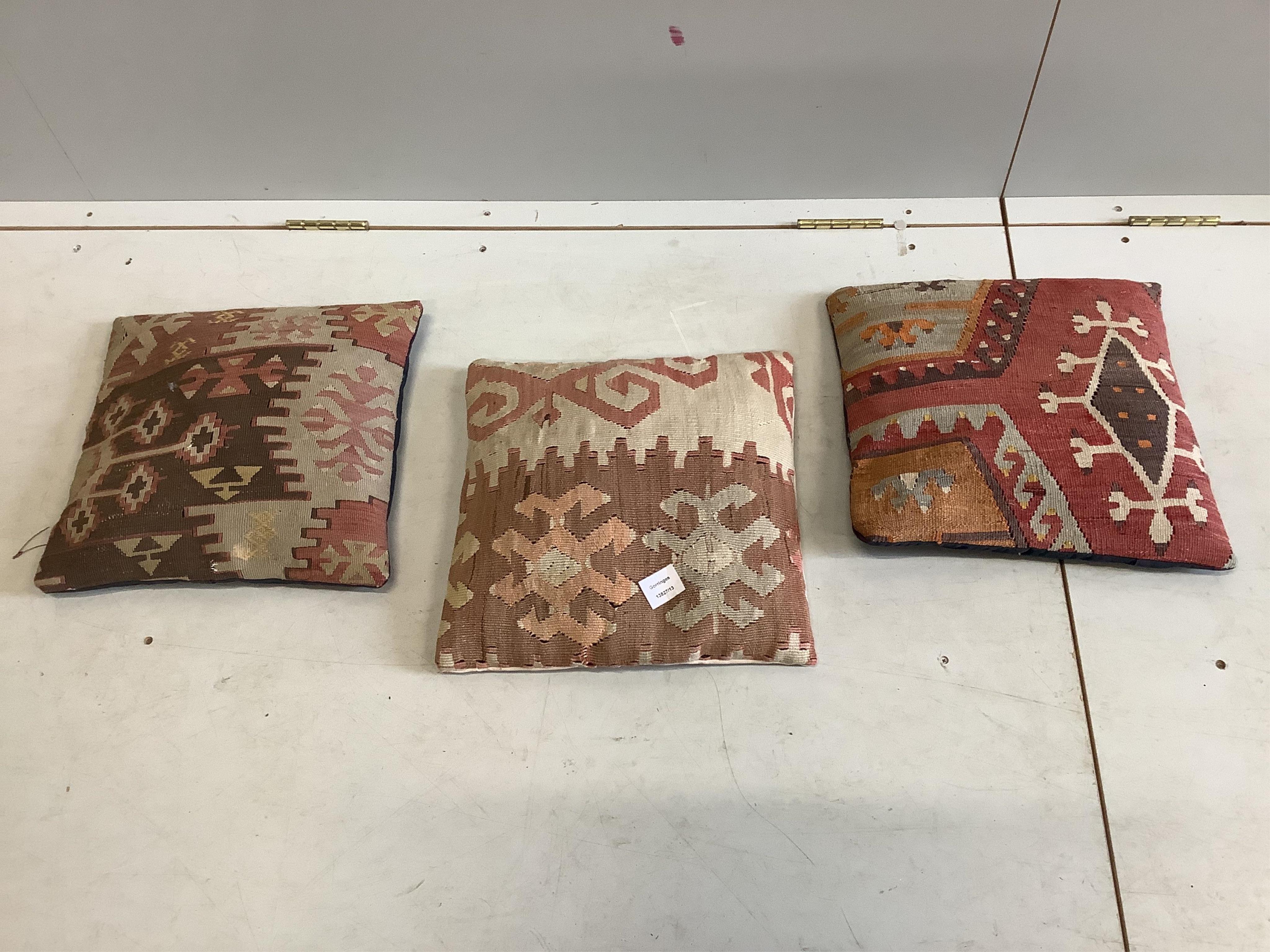 Three square Kilim cushions, 38cm. Condition - fair
